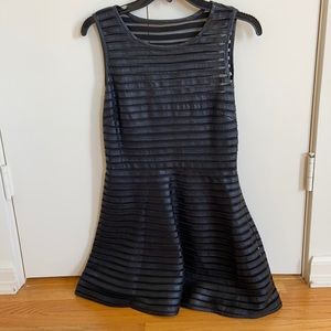Unique edgy leather and mesh mini dress